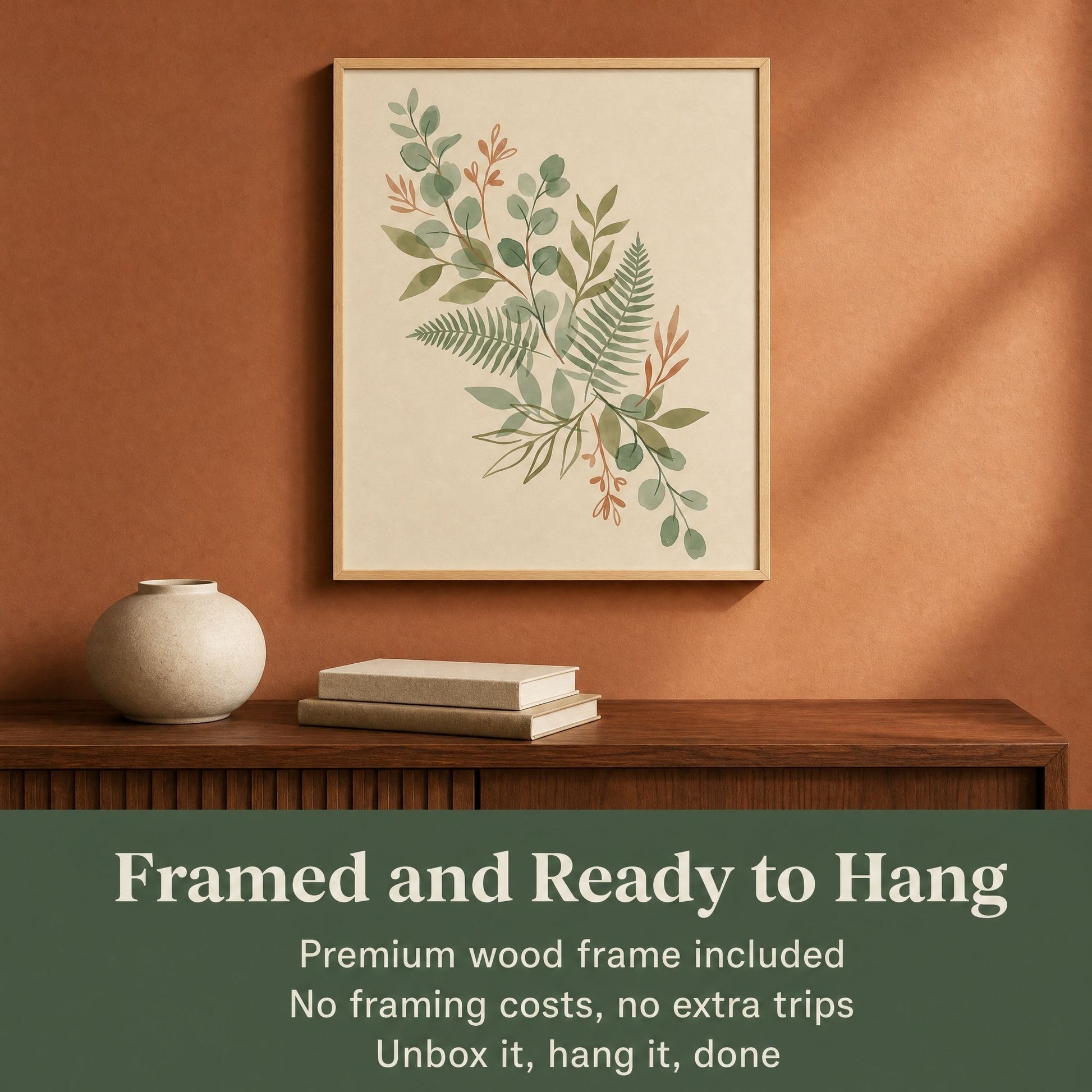 Framed eucalyptus and fern print above a console, noting the pine frame is included and ready to hang