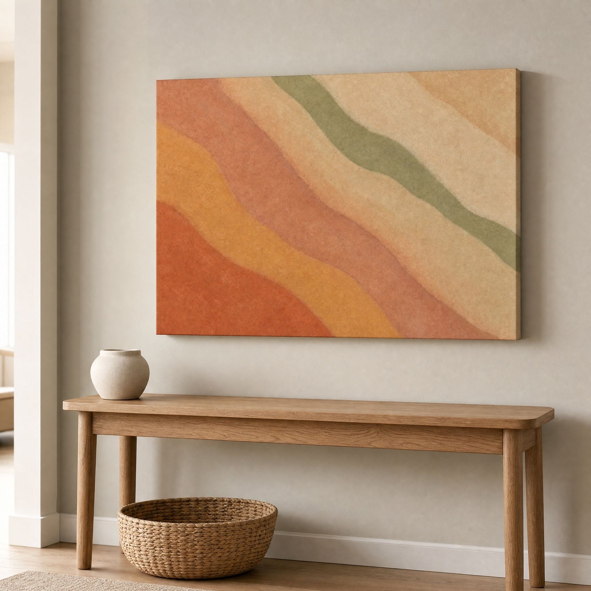 Canvas above a wooden hallway bench with a small vase and a woven basket