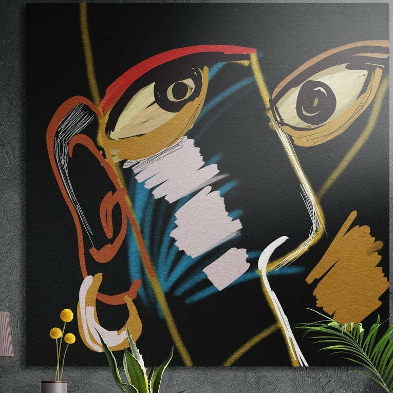Abstract line face with red glasses in gold, blue and pink strokes, brushed aluminum wall art on a dark wall behind plants
