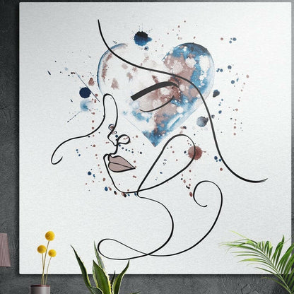 Continuous black line drawing of a woman's face over a blue and rose watercolor heart on white, brushed aluminum wall art