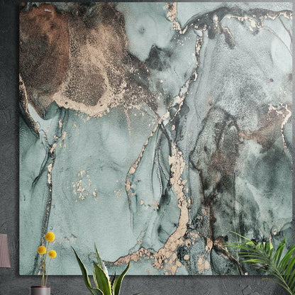 Sage green marble with copper veins and a bronze patch, brushed aluminum wall art on a dark wall behind plants
