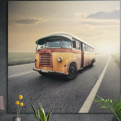 Weathered yellow vintage bus on an open road at dawn, brushed aluminum wall art on a dark wall behind plants