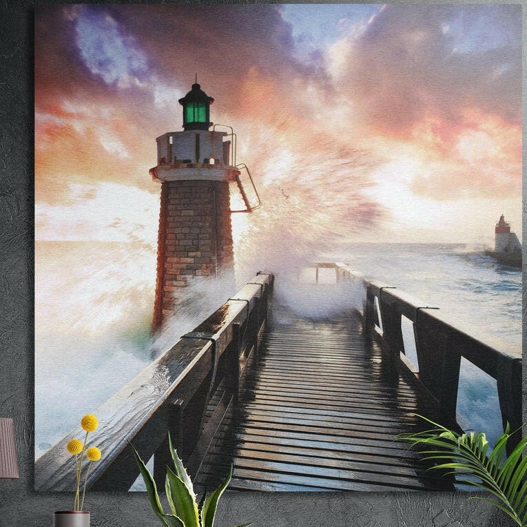 Brick lighthouse and wooden pier as waves break under a sunset sky, brushed aluminum wall art behind plants
