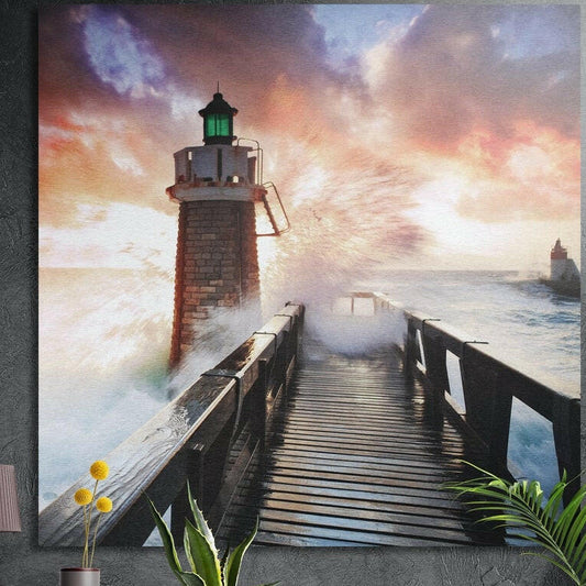 Brick lighthouse and wooden pier as waves break under a sunset sky, brushed aluminum wall art behind plants