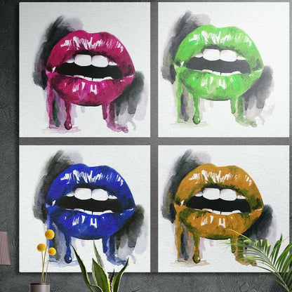 Four painted dripping lips in magenta, green, blue and amber in a grid, brushed aluminum wall art behind plants