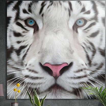 Close view of a white tiger face with ice blue eyes, brushed aluminum wall art on a dark wall behind plants