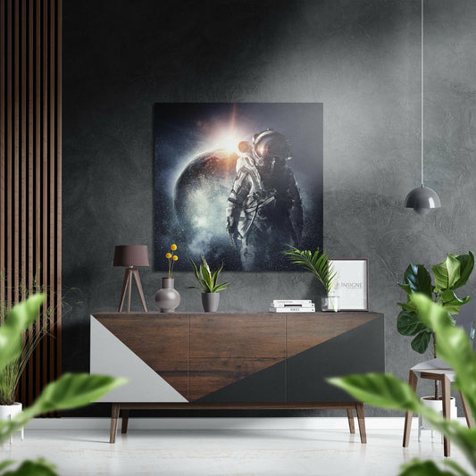 Astronaut eclipsed planet metal wall art