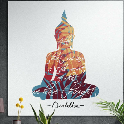 Seated Buddha silhouette filled with red, orange and teal leaves and white script on white, brushed aluminum wall art