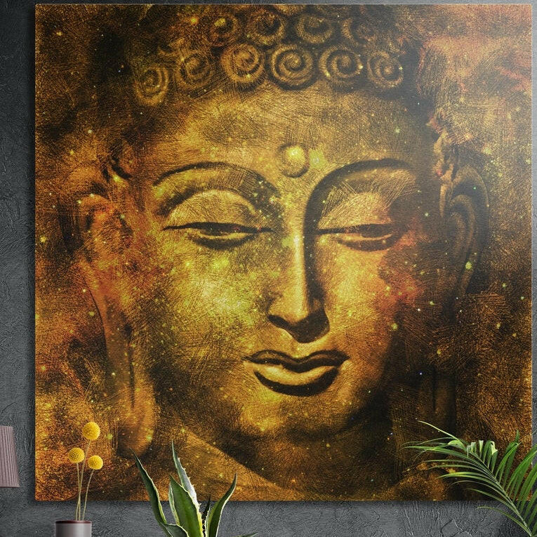 Golden Buddha face with curled hair and half-closed eyes, brushed aluminum wall art above potted plants