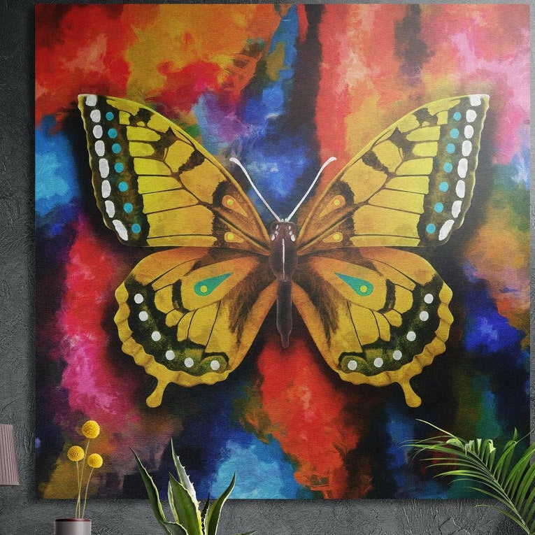 Yellow swallowtail butterfly on a rainbow background, brushed aluminum wall art on a gray wall above yellow flowers