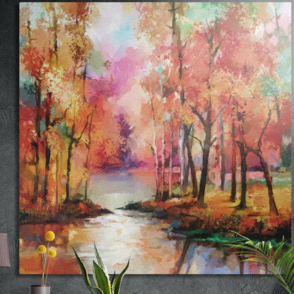 Autumn forest stream brushed aluminum wall art on a dark gray wall with plants in front of its lower edge