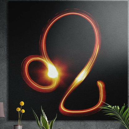 Leo zodiac sign in fiery red light brushed aluminum wall art on a gray concrete wall above plants