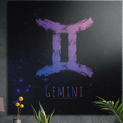 Gemini zodiac sign in purple blue brushstrokes brushed aluminum wall art on a gray concrete wall above plants