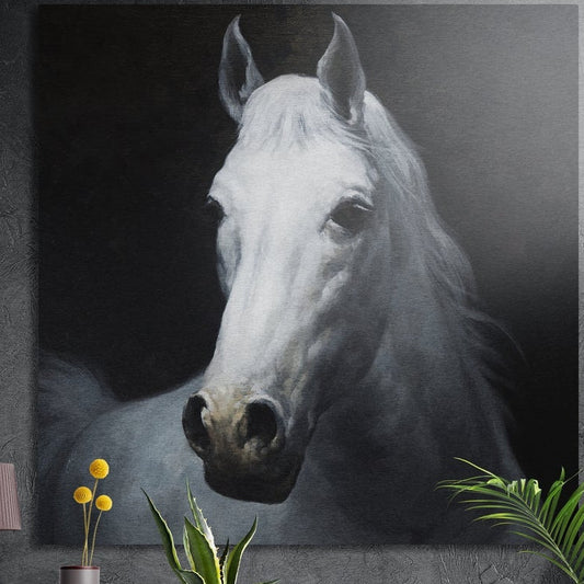 White horse portrait brushed aluminum wall art on a dark concrete wall above a vase and plants