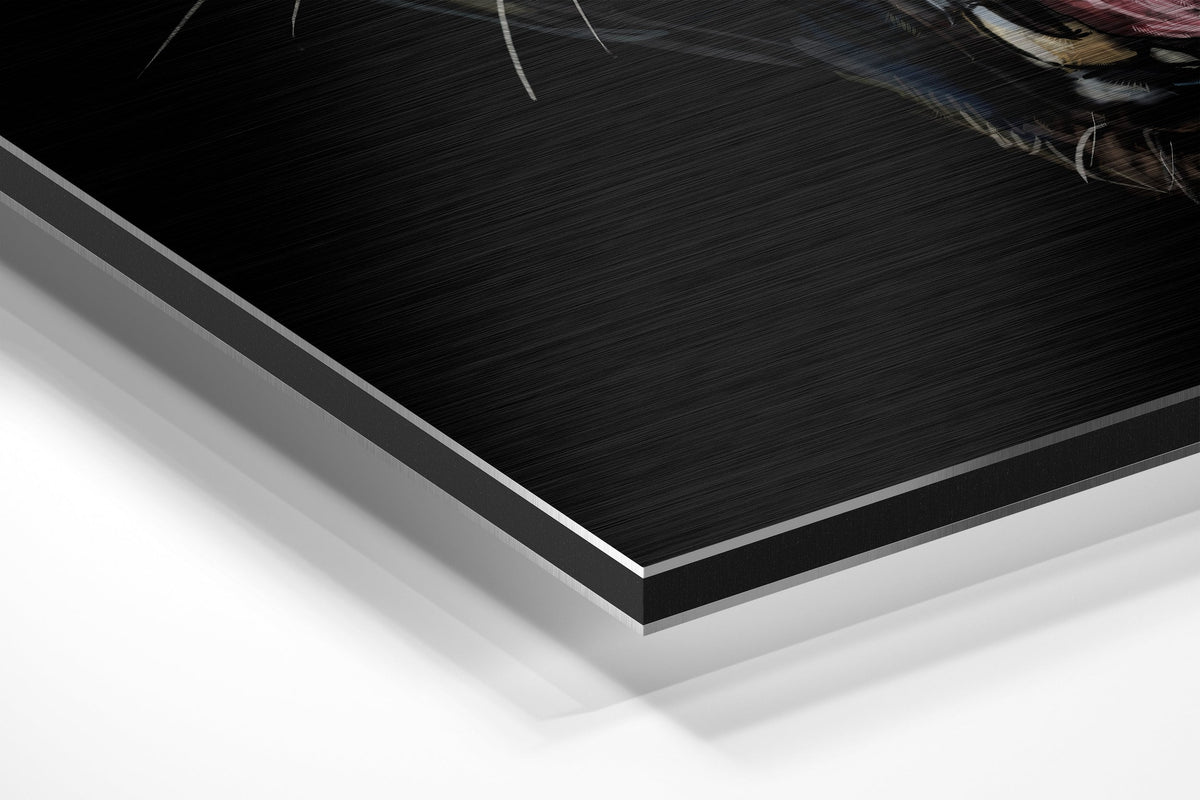 Snarling black panther brushed aluminum panel corner close-up showing the brushed metal grain