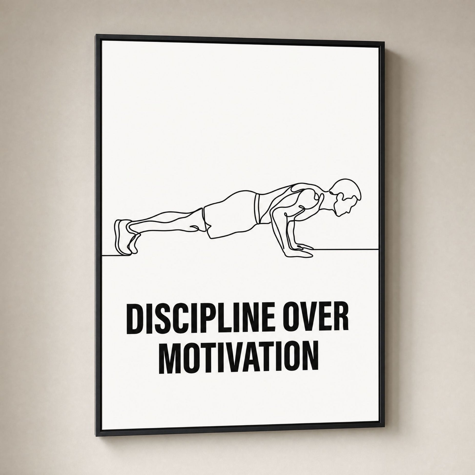 Discipline Over Motivation wall art, a line drawing of a figure in a push-up, framed in black and ready to hang