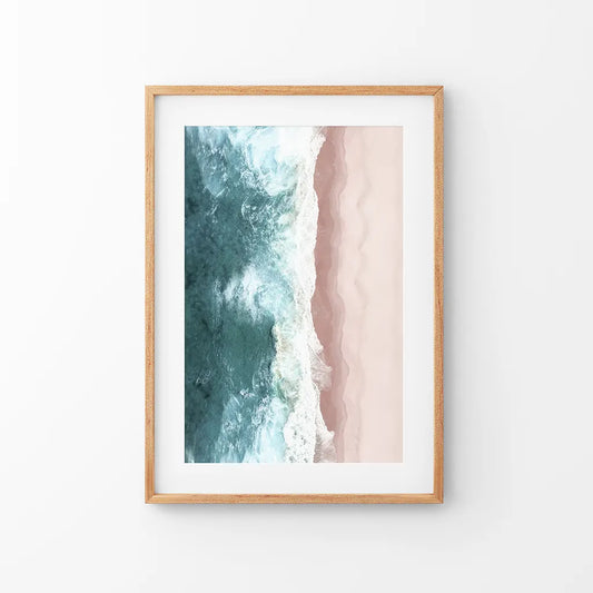 Aerial view of blue ocean waves on pink sand beach, coastal wall art print