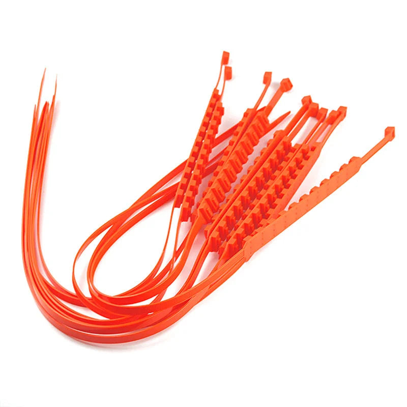 Anti skid tire traction cable ties set laid out for installation