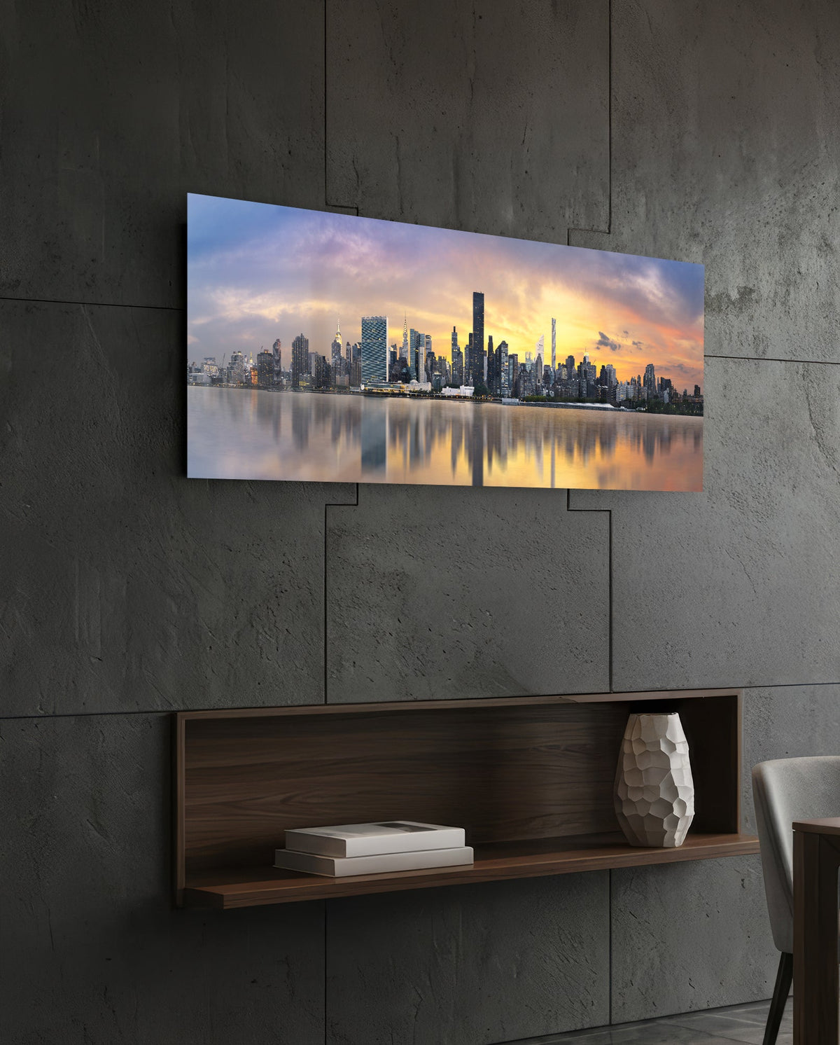 New York sunset skyline panoramic glass wall art on a dark wall above a recessed wooden shelf