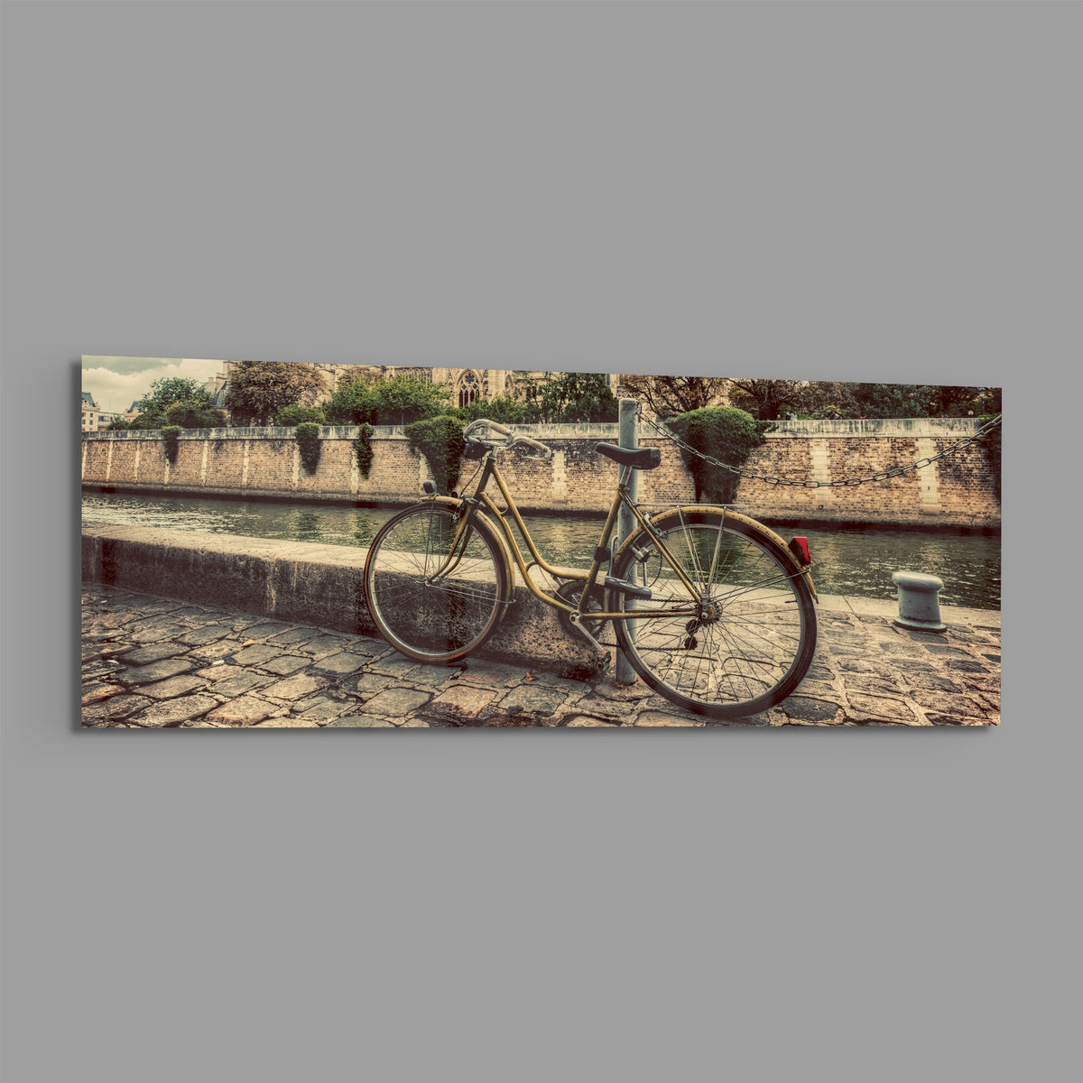 Vintage riverside bicycle panoramic glass piece shown on a plain gray background