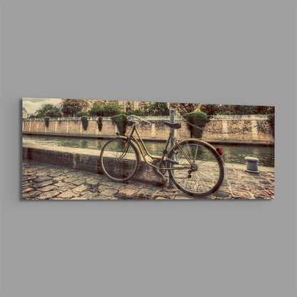 Vintage riverside bicycle panoramic glass piece shown on a plain gray background
