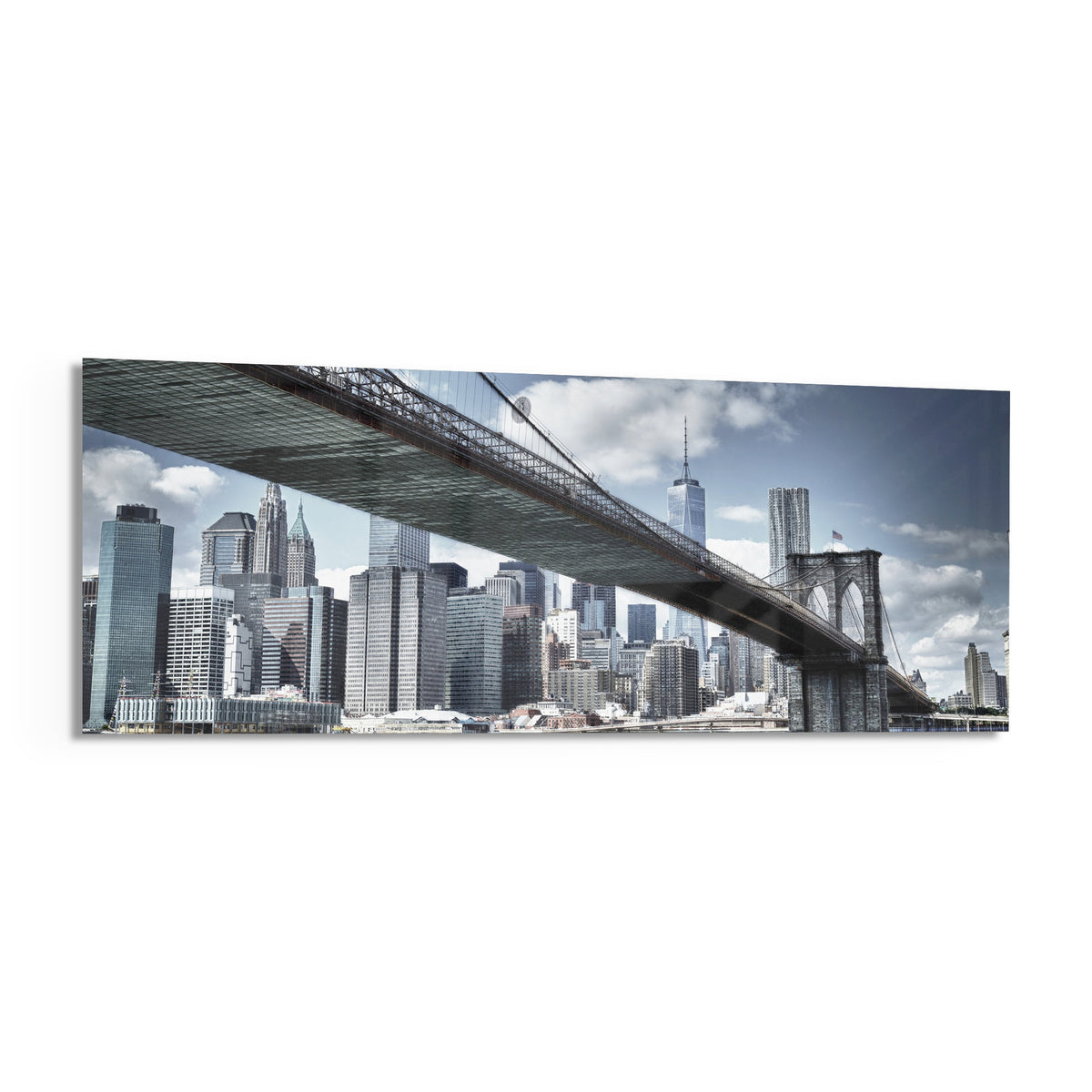 Brooklyn Bridge skyline panoramic glass wall art shown at an angle on a white background