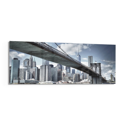 Brooklyn Bridge skyline panoramic glass wall art shown at an angle on a white background
