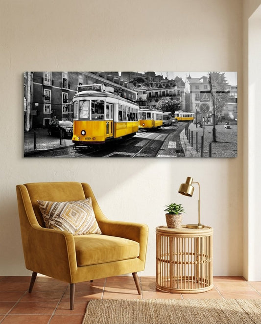 Lisbon yellow tram panoramic glass wall art above a mustard armchair and rattan side table