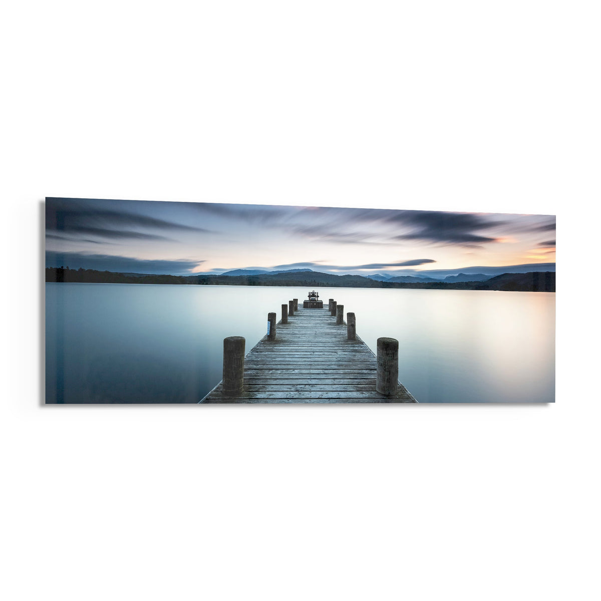 Blue hour lake jetty panoramic glass print angled on a white background