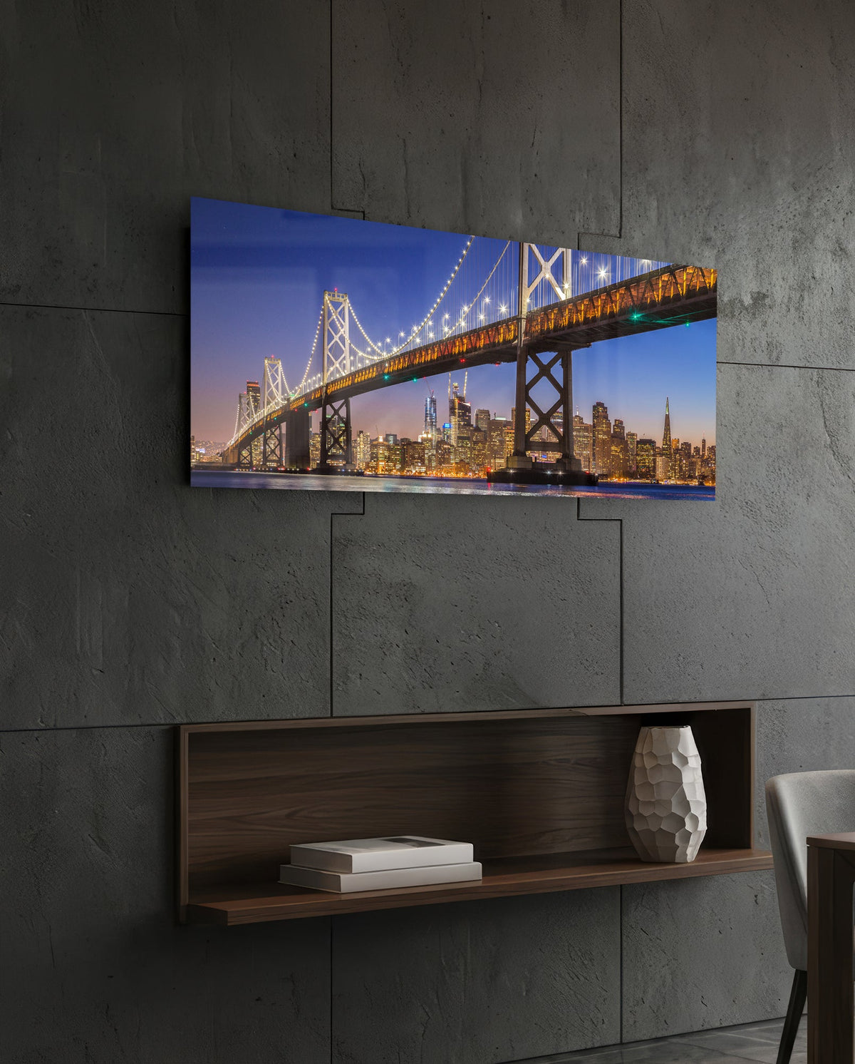 San Francisco Bay Bridge panoramic glass wall art on a dark wall above a recessed wooden shelf