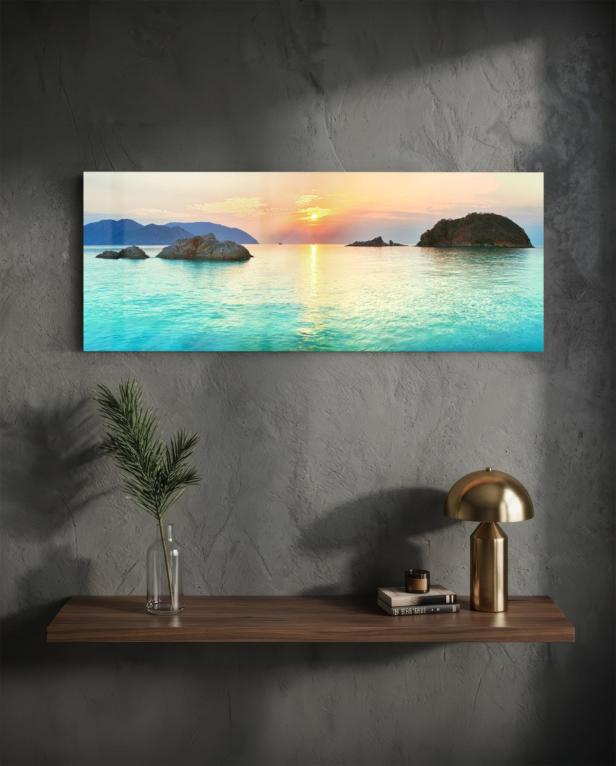 Turquoise bay islets at sunset glass wall art above a floating walnut shelf with a brass lamp