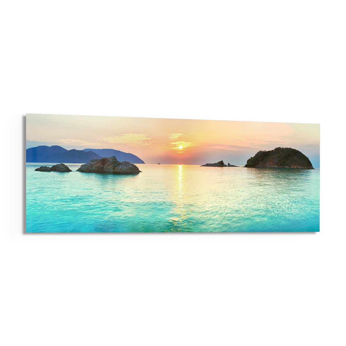 Turquoise bay islets at sunset panoramic glass print angled on a white background