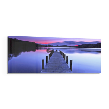 Purple twilight lake jetty panoramic glass print angled on a white background