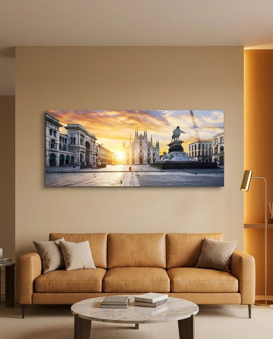 Cathedral square panoramic glass wall art above a tan leather sofa and a marble coffee table