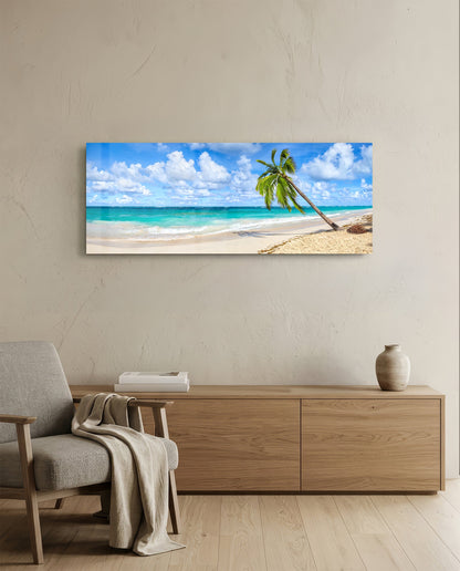 Tropical palm tree beach glass wall art above a light oak sideboard beside a cream armchair