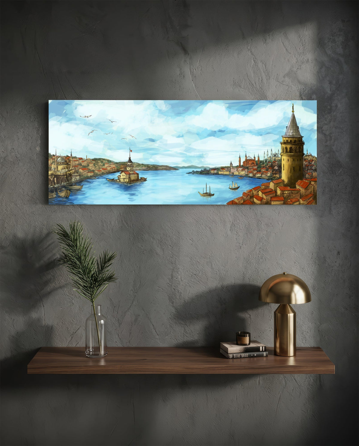 Old Istanbul Bosphorus panoramic glass wall art on a dark wall above a shelf with a gold lamp