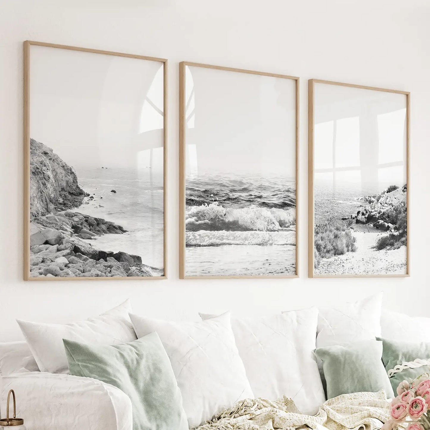 Set of 3 black and white coastal prints with waves and a rocky beach