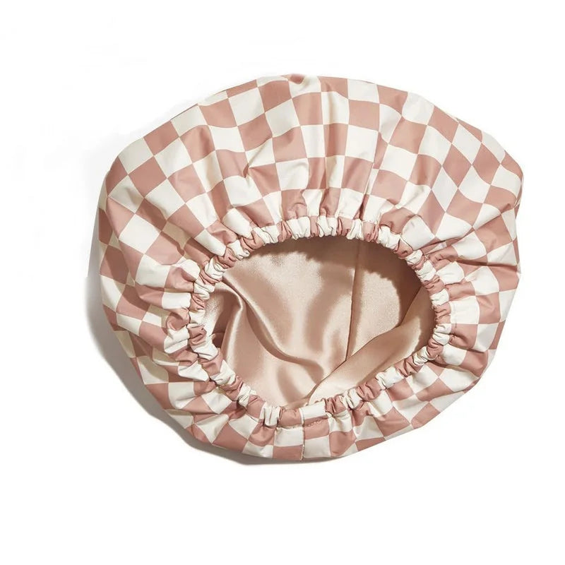 Beige checkered nursing shower cap interior view showing satin lining and elastic gather