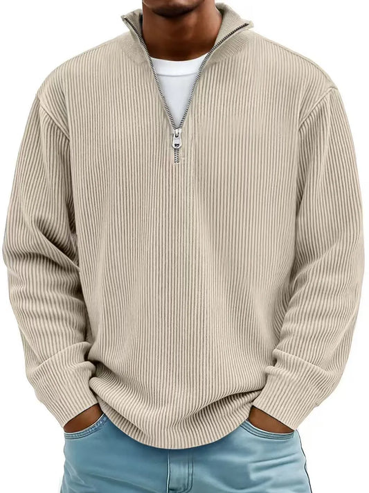 Beige ribbed sweater with a zipper worn by a person on a white background