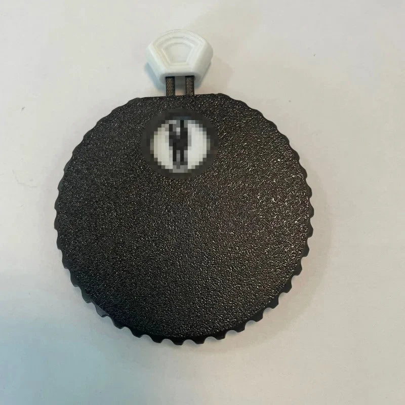 Black couple position selector with press button spinner mechanism closeup