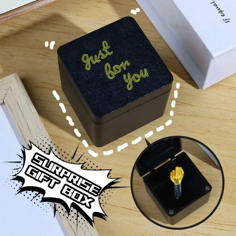Black gift box with gold text saying just for you prank