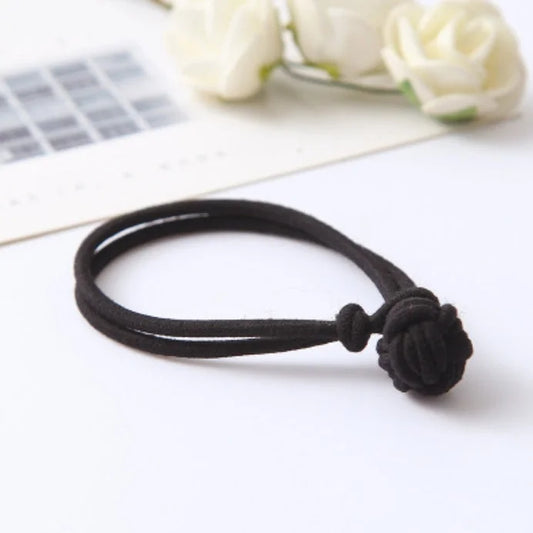 Black hair tie elastic band with knotted ball detail stretchy ponytail holder