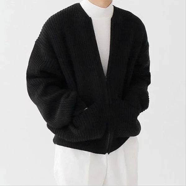 Black men’s chunky knit cardigan shown in a minimal white outfit