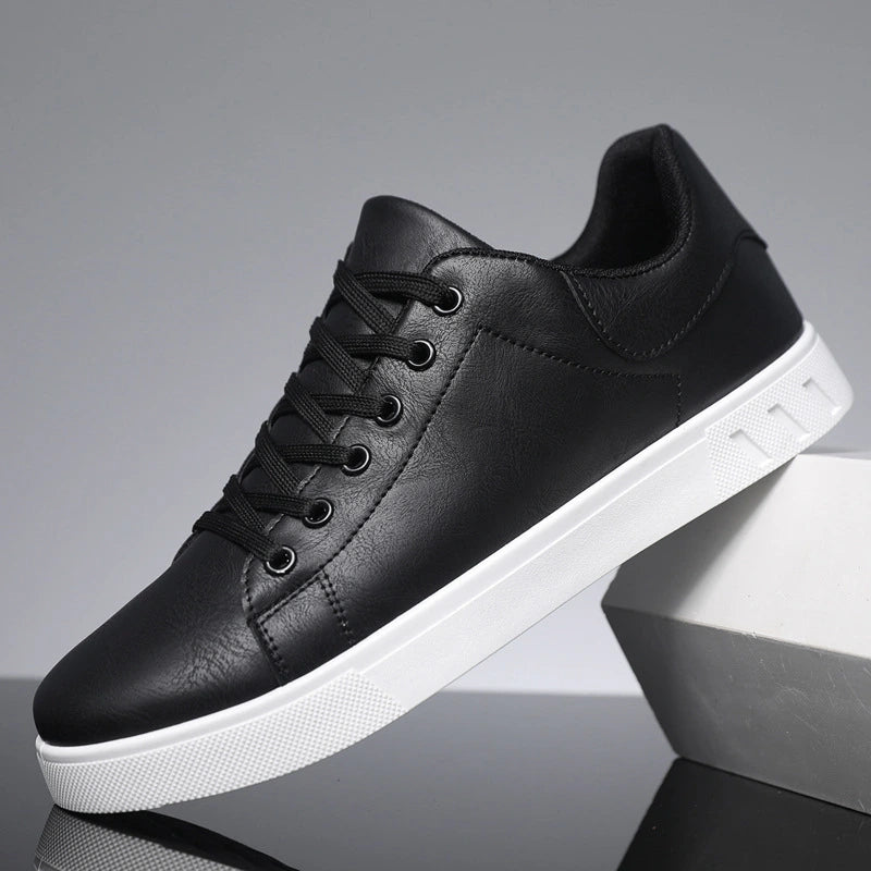 Black mens casual sneakers with white platform sole minimalist design