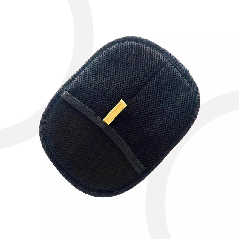 Black mesh pet hair removal glove with yellow pull tab displayed on white background.