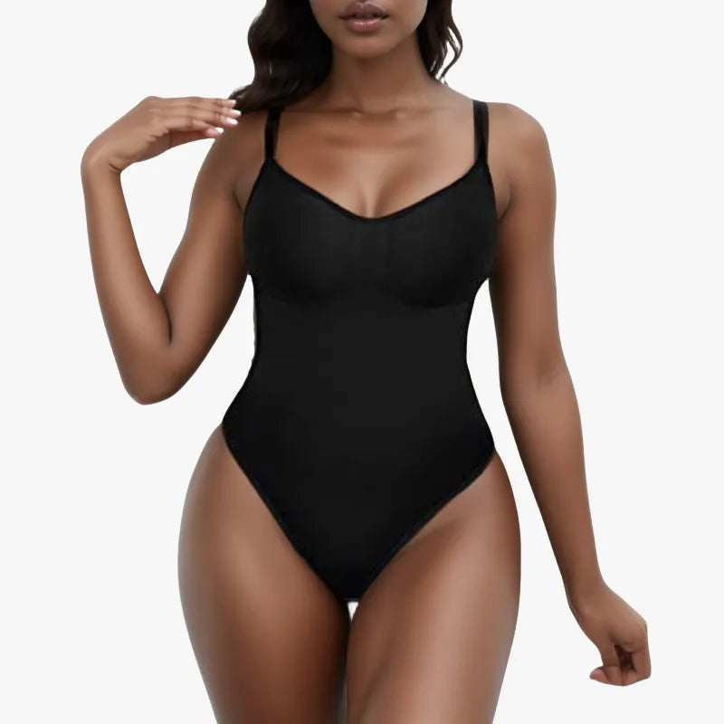 Black one-piece shapewear worn by a model on a white background