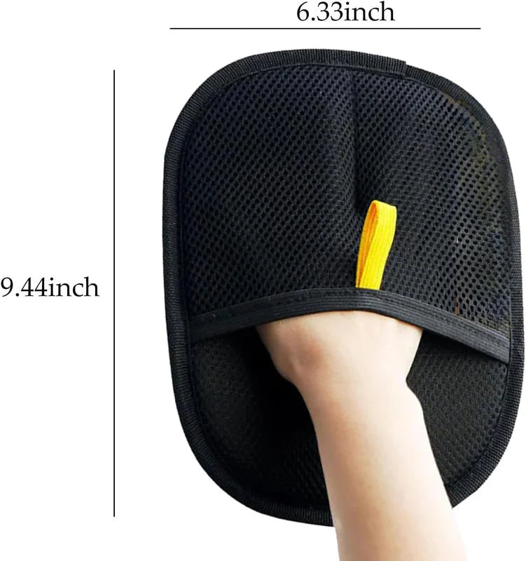 Black pet grooming glove worn on hand showing dimensions 6.33 inches by 9.44 inches.