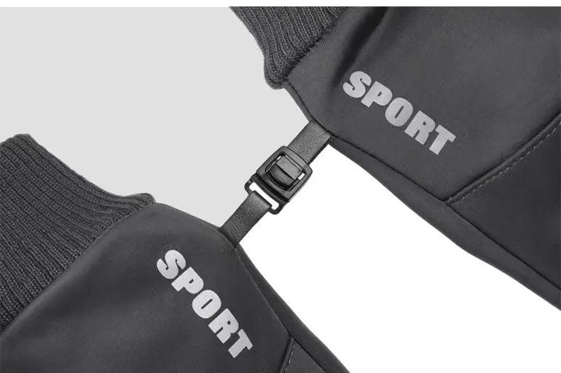 Black winter riding gloves connected by locking buckle to keep the pair together.