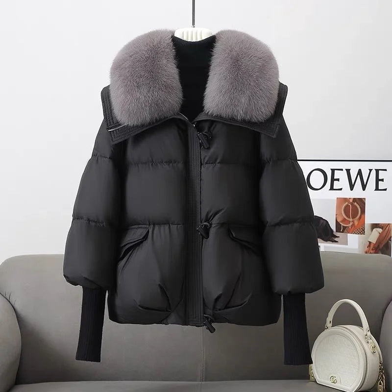 Black women's down cotton padded jacket with grey fur collar and pockets