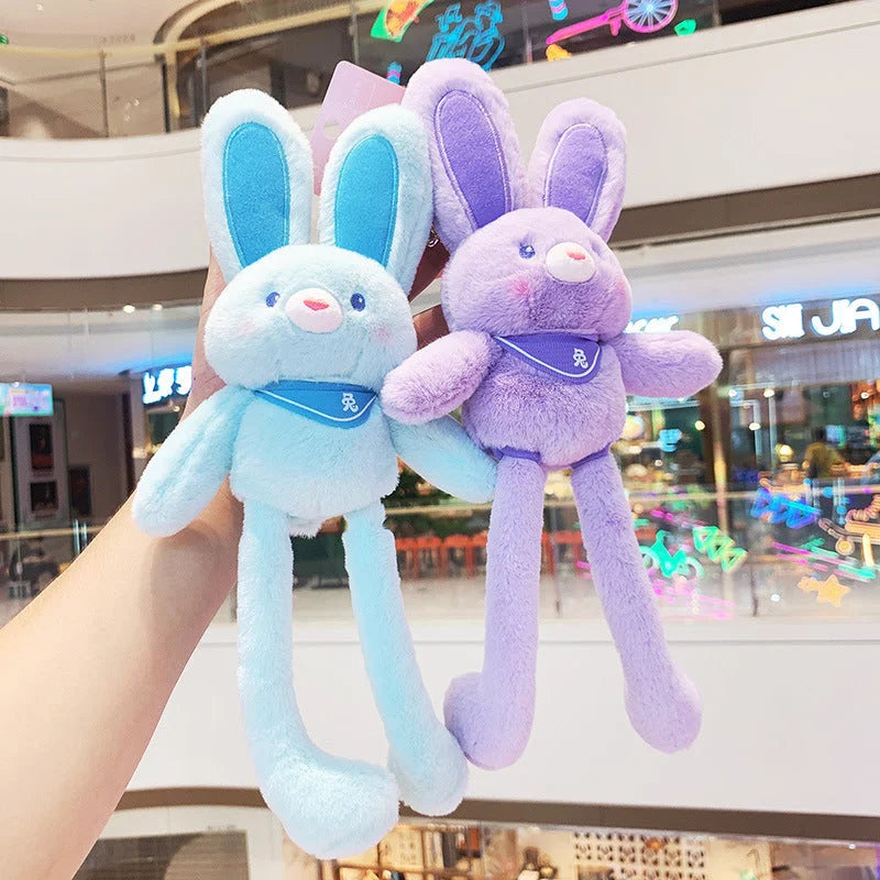 Blue and purple bunny plush keychains held together showing color variety and cute embroidered faces with collars